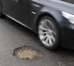 Get on with fixing potholes, PM tells councils